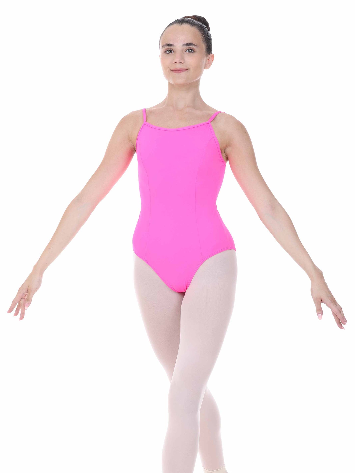 Person wearing a bright fuchsia leotard on a white background