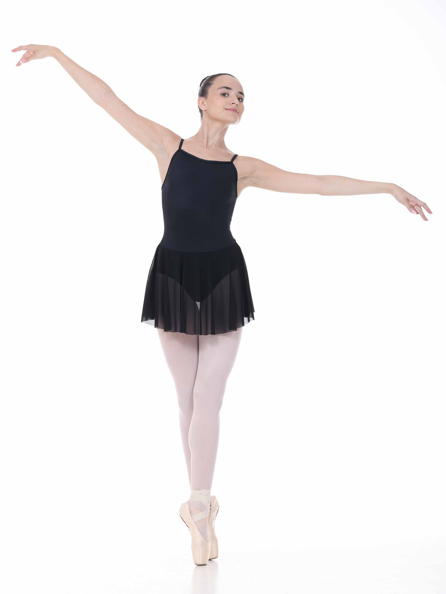 Ballerina in a black ballet dress on a white background