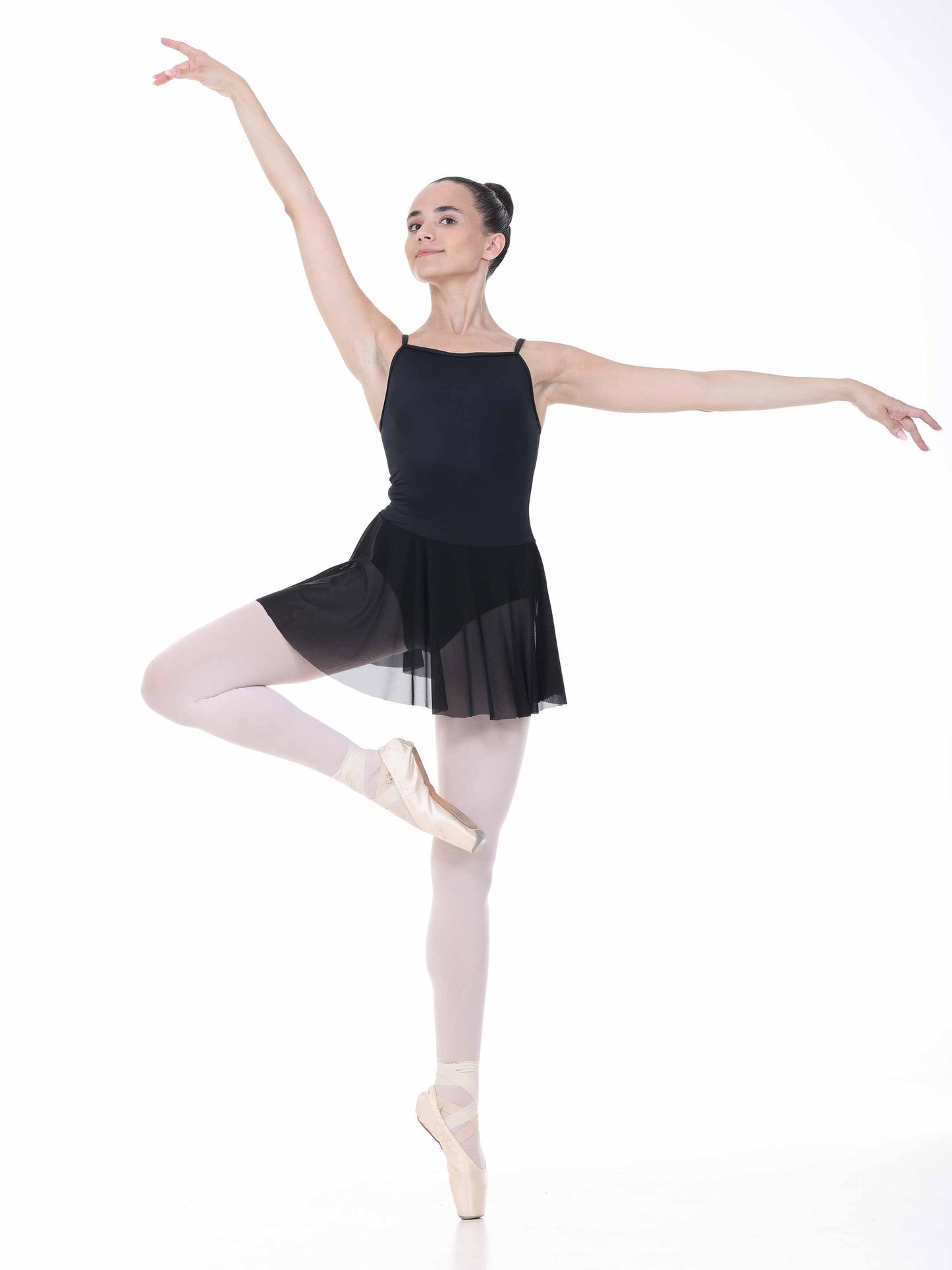 Ballerina in a black ballet dress on a white background