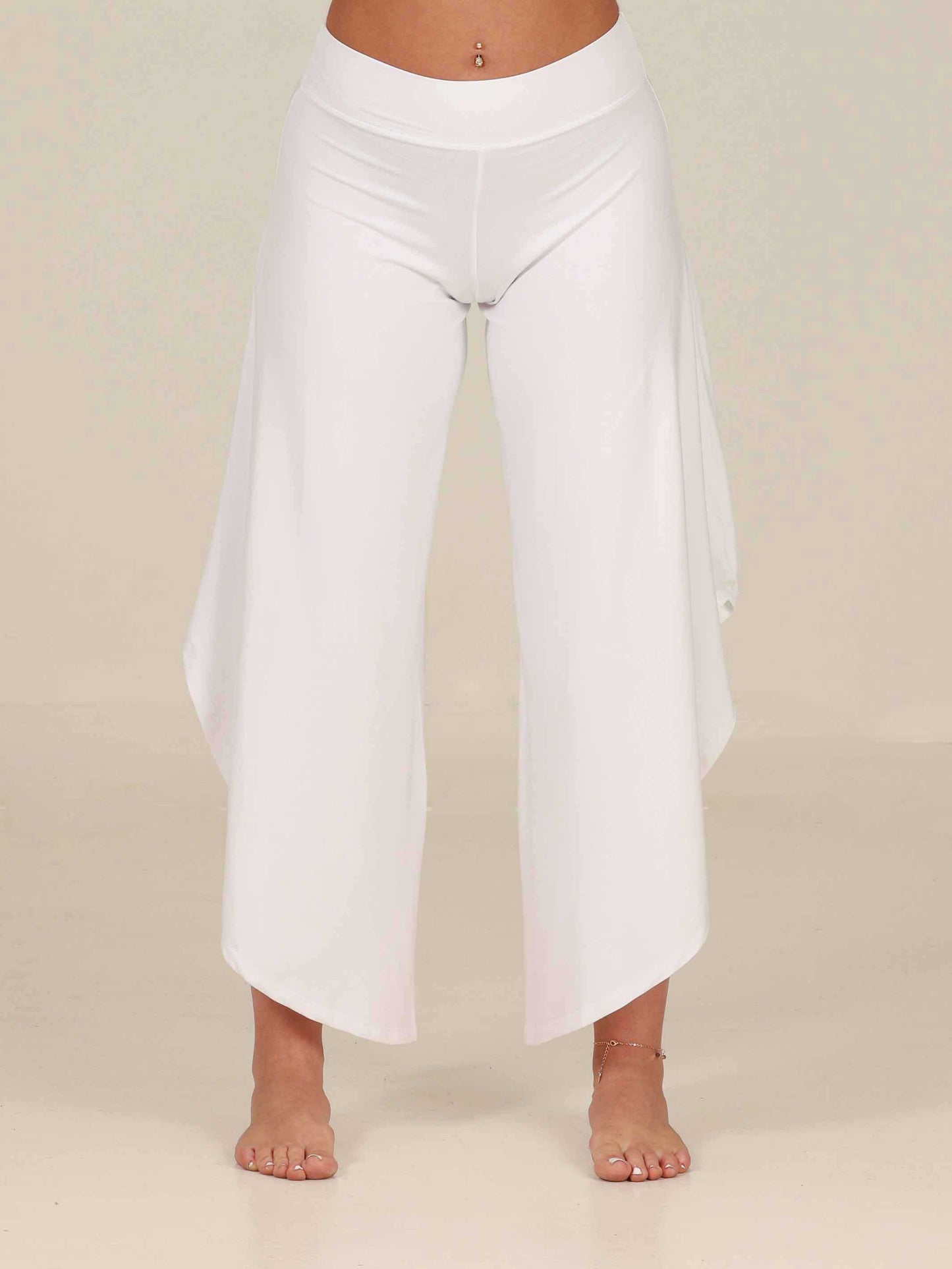 White wide-leg Jazz pants worn by a person on a beige background