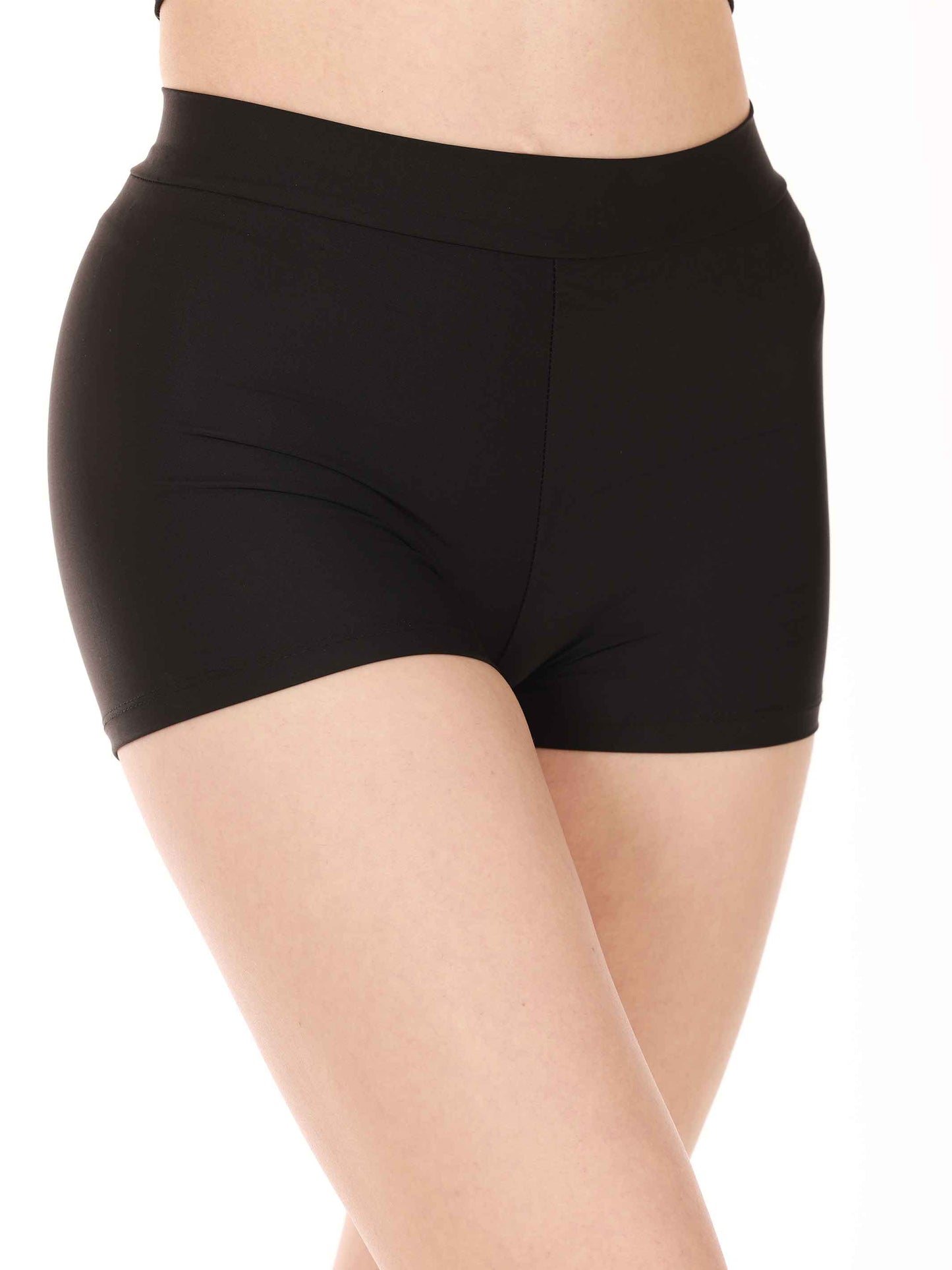 Black shorts worn by a person on a white background