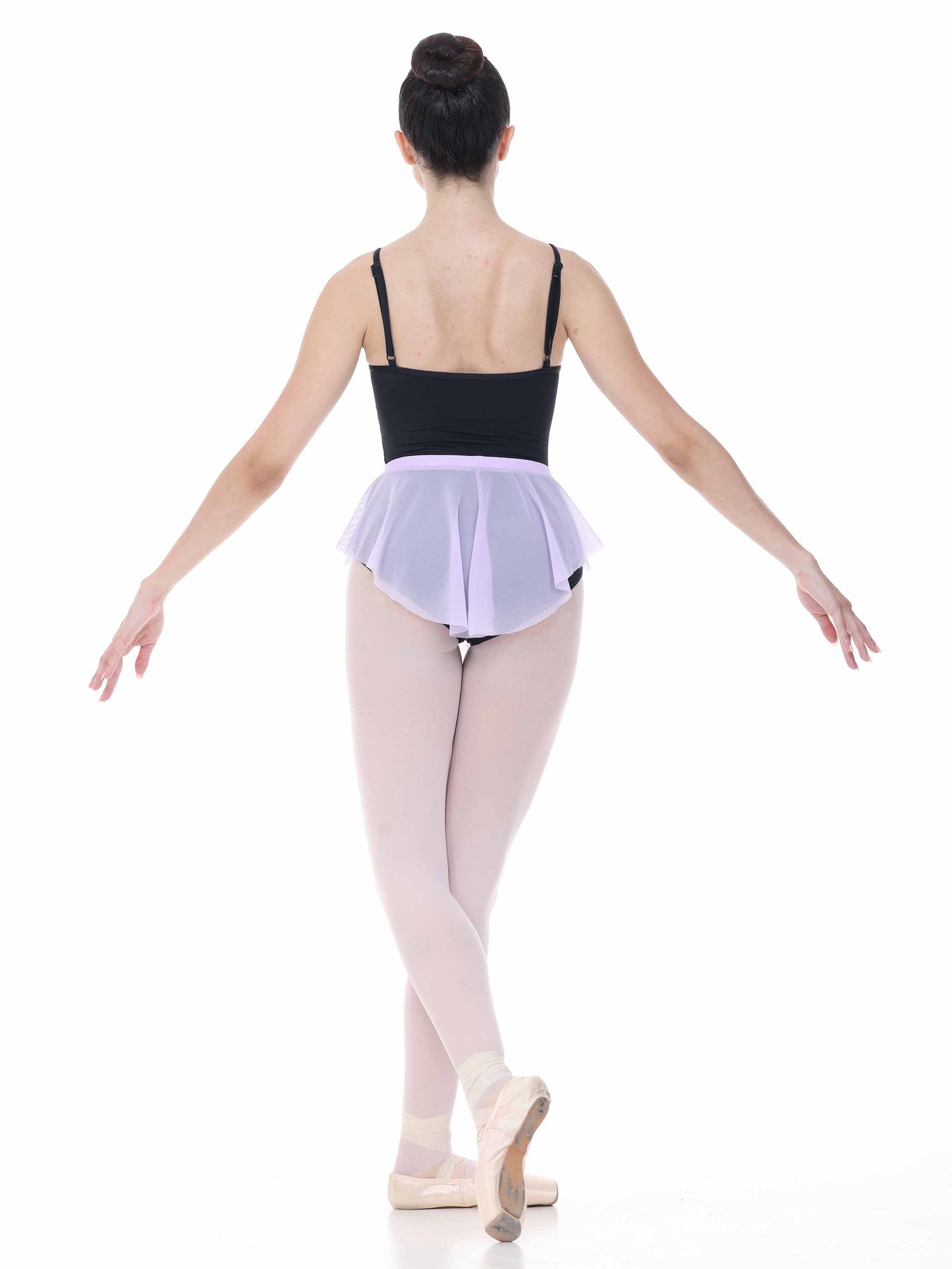 ballerina wearing an oval lilac ballet skirt with a black leotard