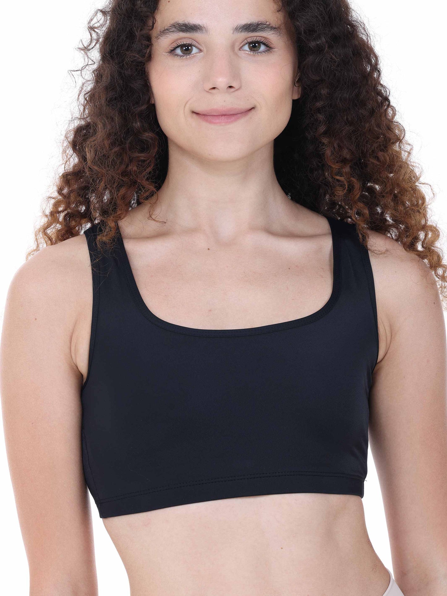 Person wearing a black sports bra on a white background