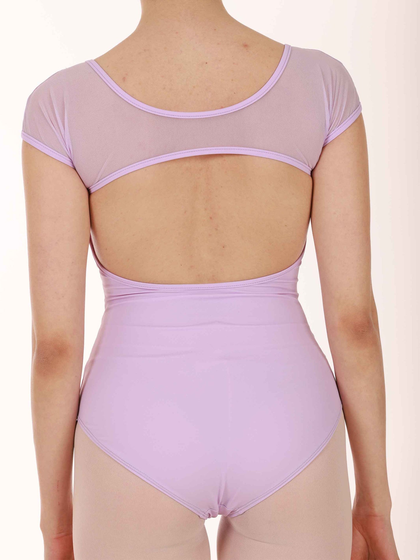 Lavender leotard with open back on a white background
