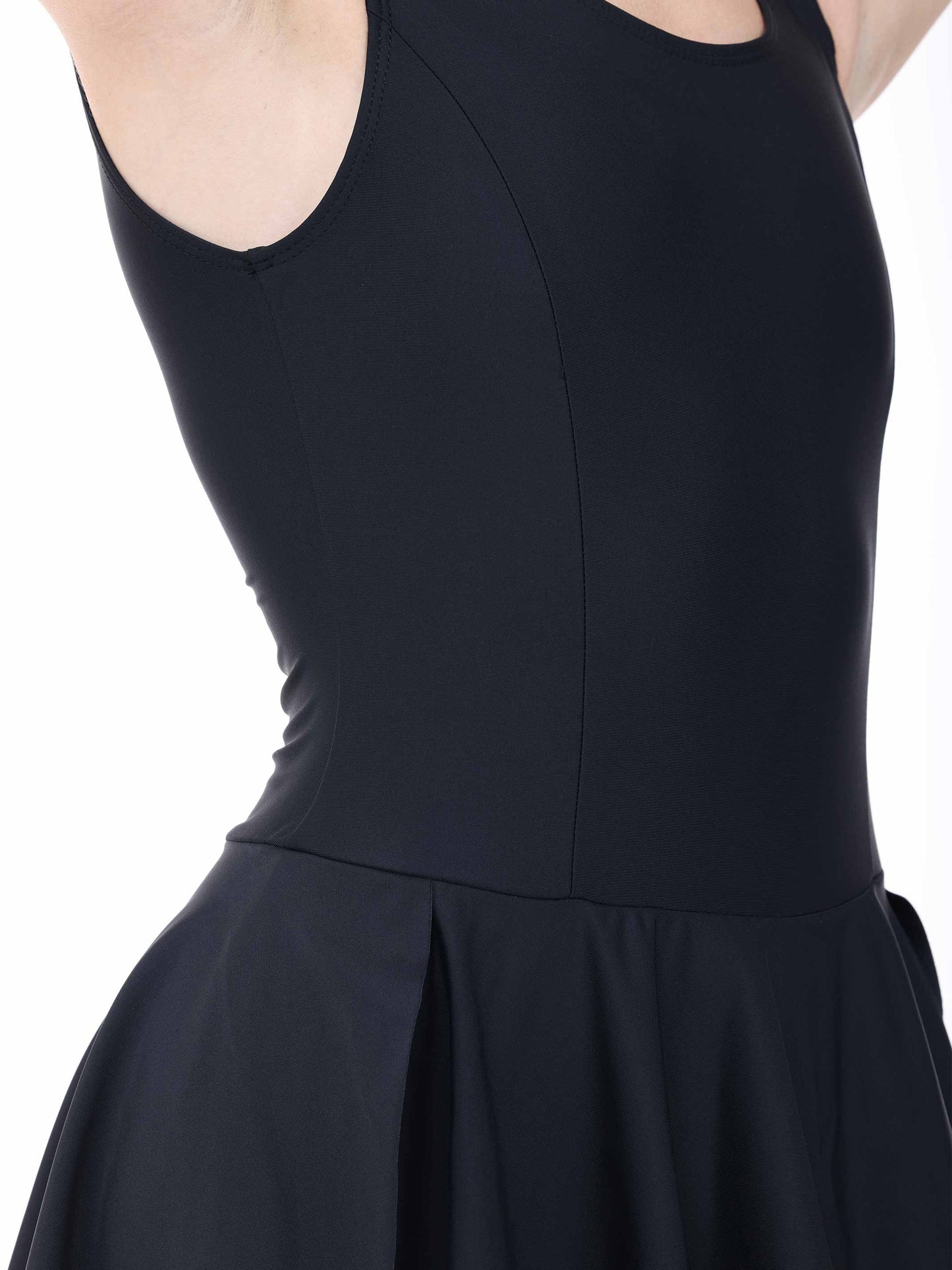 Black sleeveless ballet dress with a fitted bodice and flared skirt on a white background