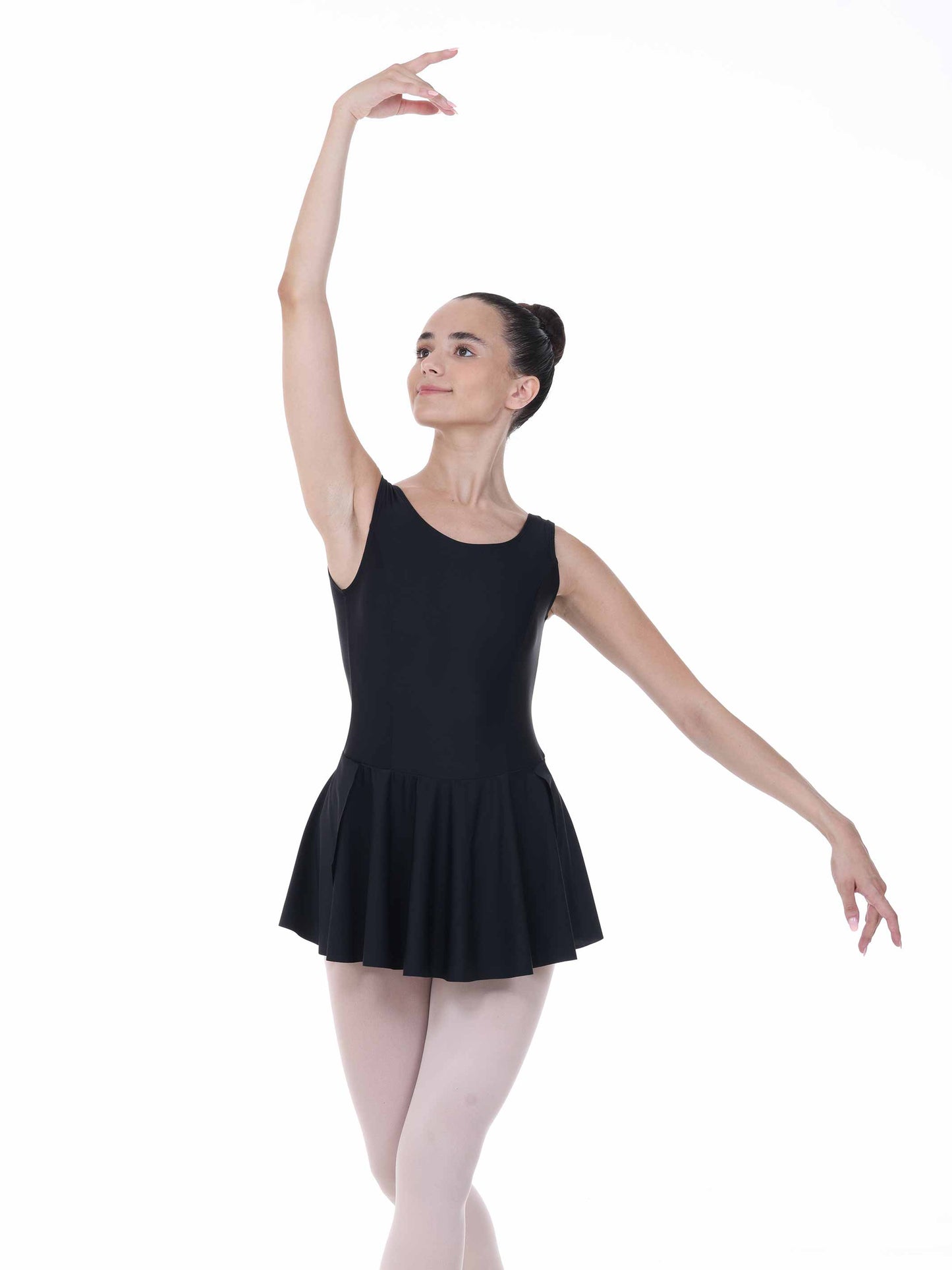 Ballerina in a black leotard and pink tights on a white background