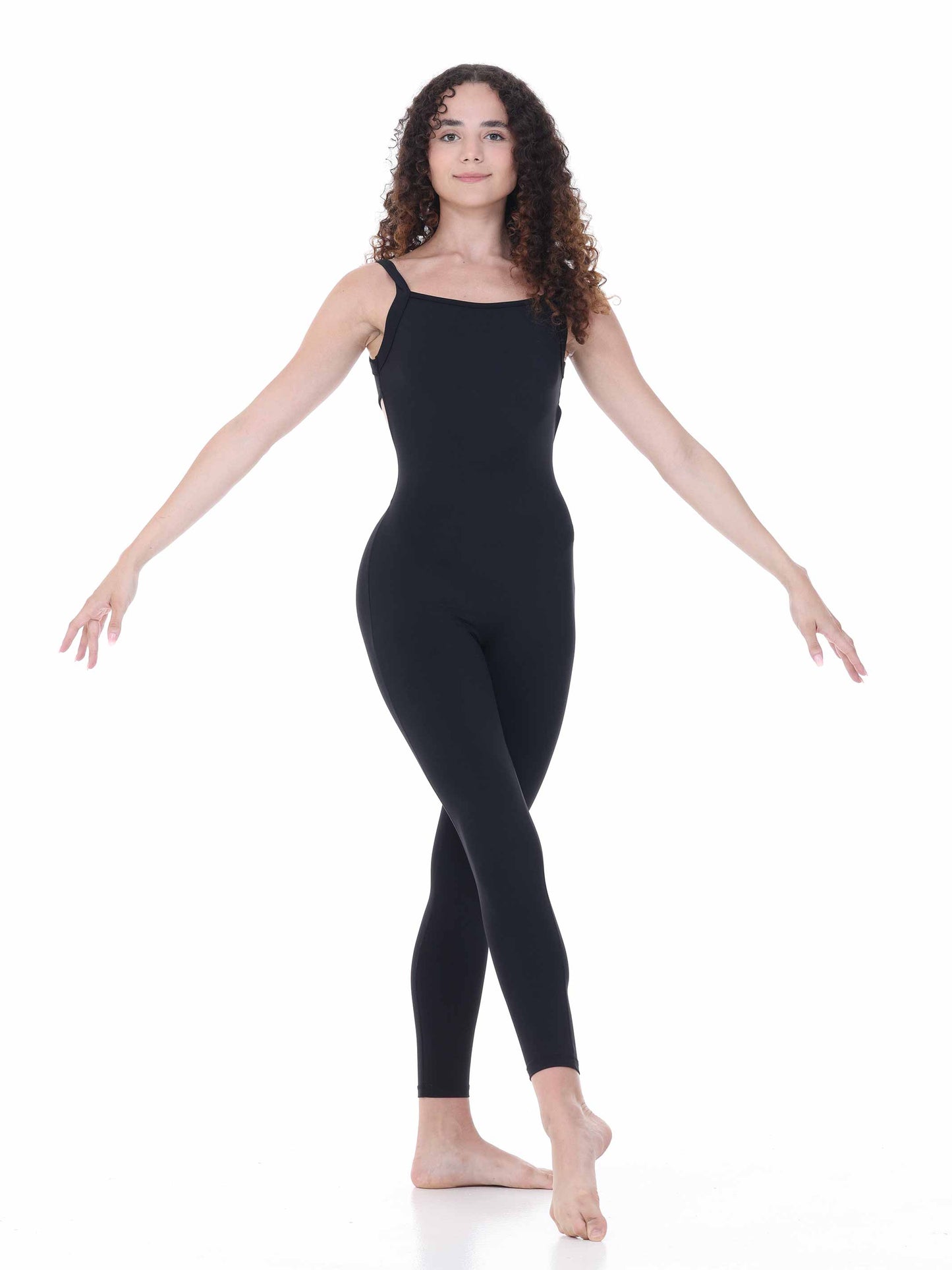 Person wearing a black unitard on a white background