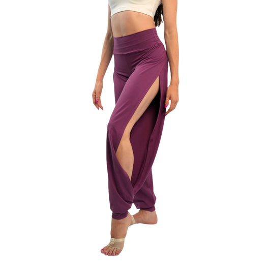 A pair of purple yoga dance jazz pants with a high-waisted fit and wide-leg design, featuring a secure waistband and a gathered ankle hem.