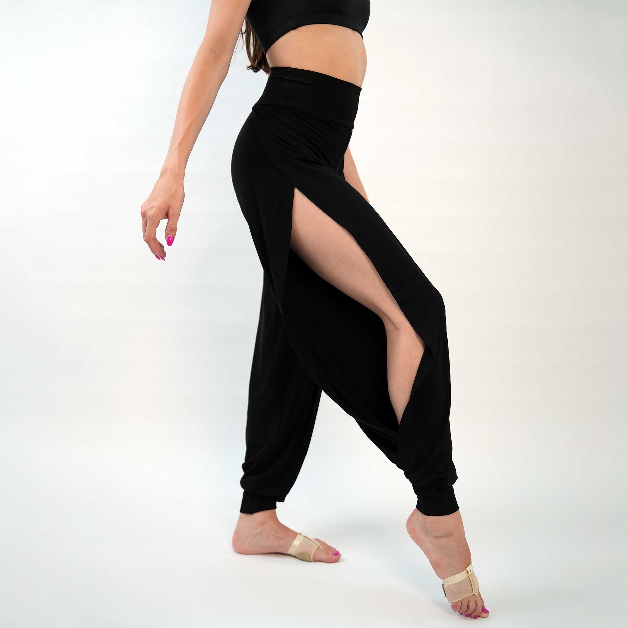 A pair of black yoga dance jazz pants with a high-waisted fit and wide-leg design, featuring a secure waistband and a gathered ankle hem.