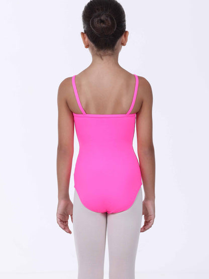 Person wearing a bright pink leotard on a white background