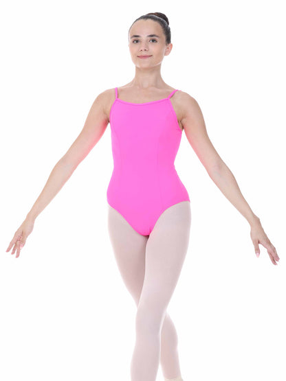 Person wearing a bright fuchsia leotard on a white background