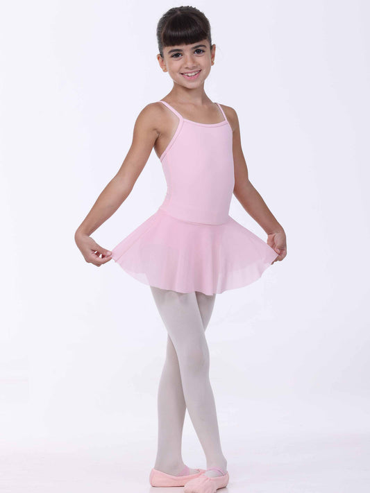 Young girl in a pink ballet dress and tights on a white background