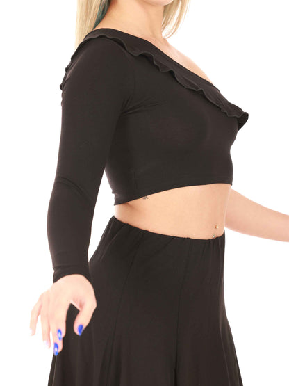 Black long-sleeve crop top with ruffled neckline worn by a person on a white background