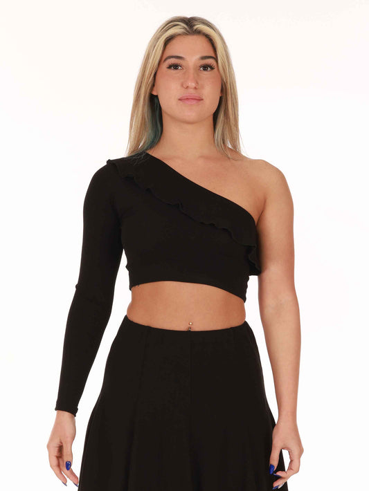 Woman wearing a black one-shoulder top against a white background