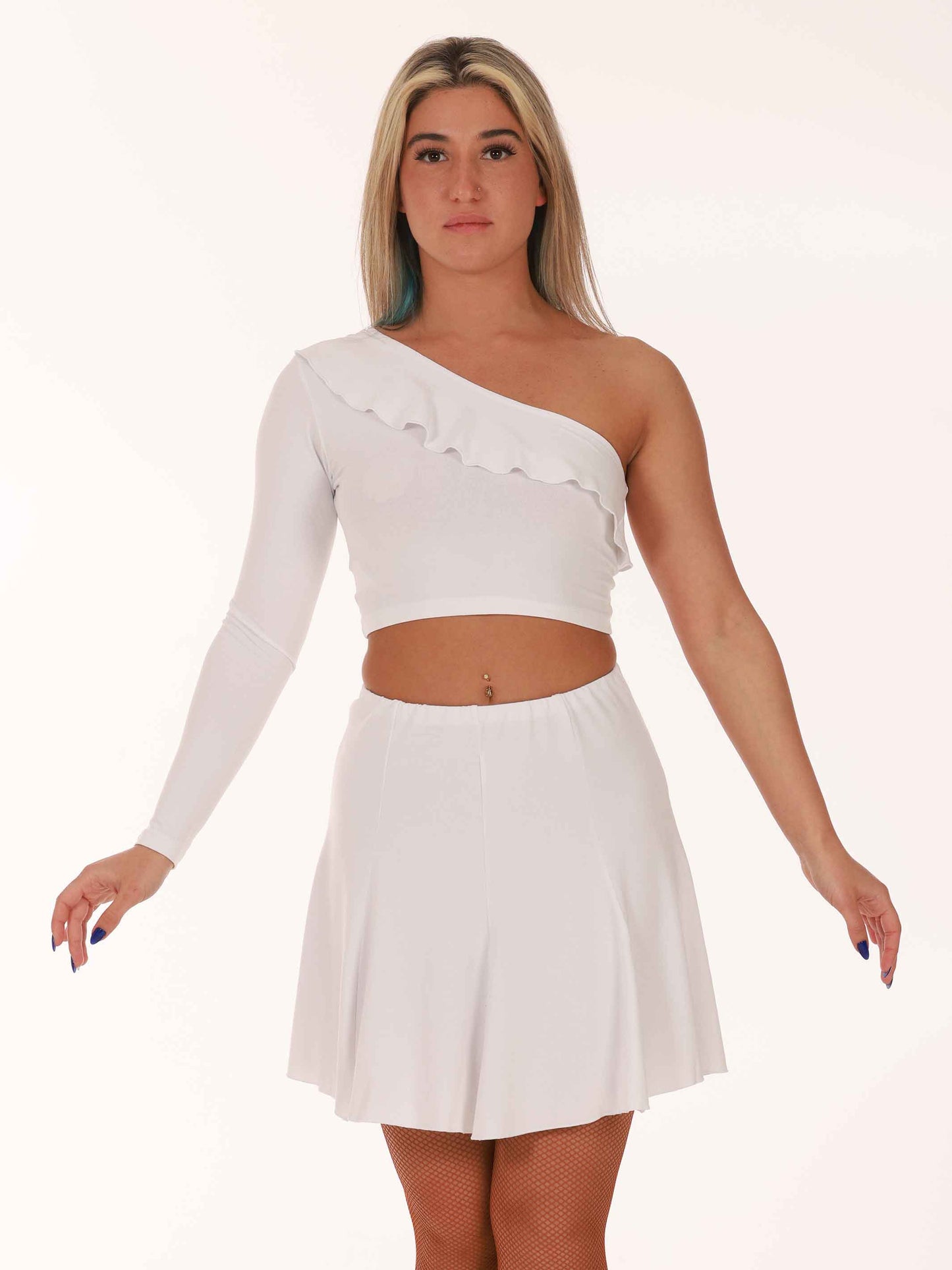 Woman wearing a white one-shoulder top and skirt set on a plain background