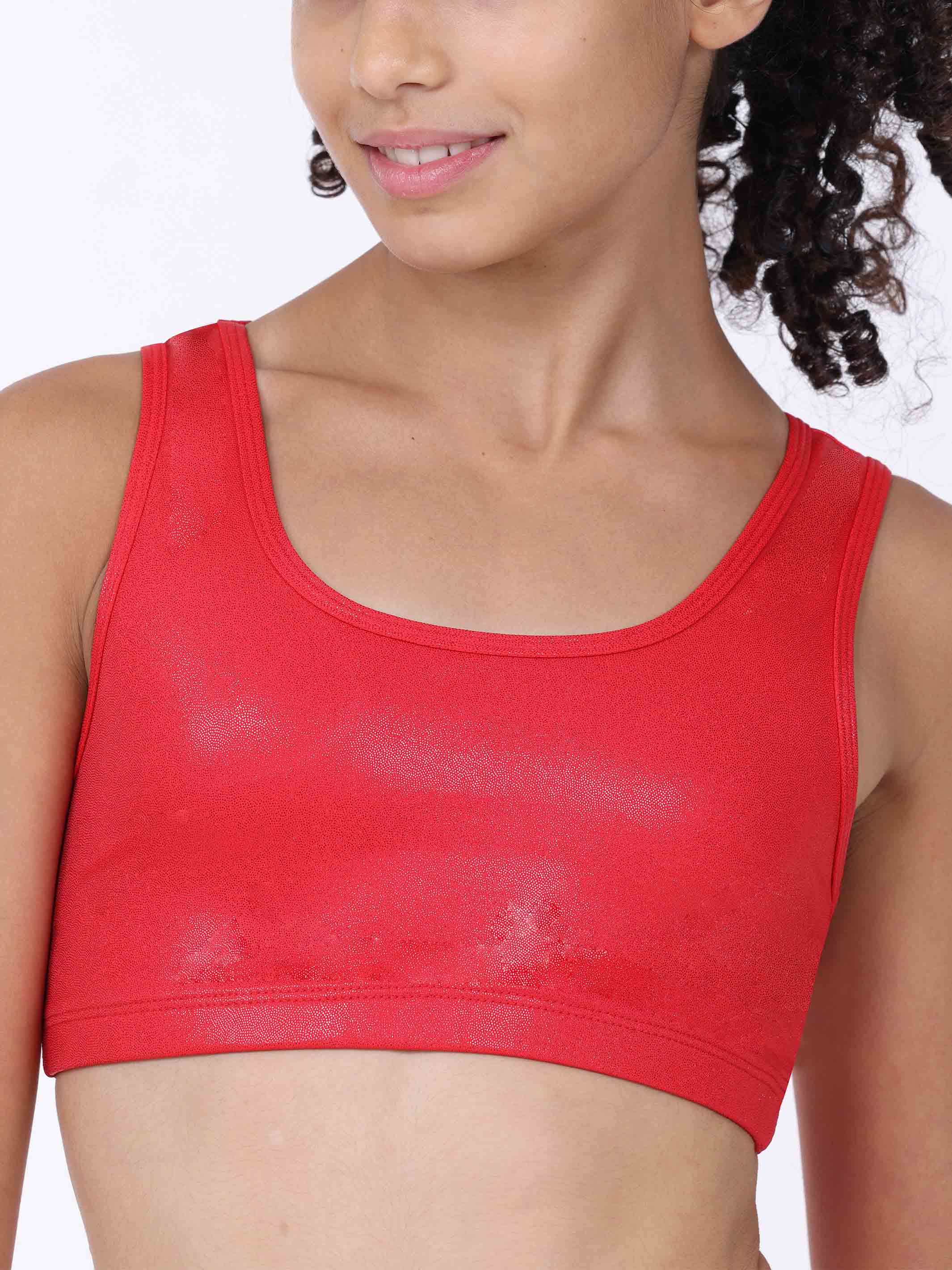 Red sports bra worn by a person on a white background