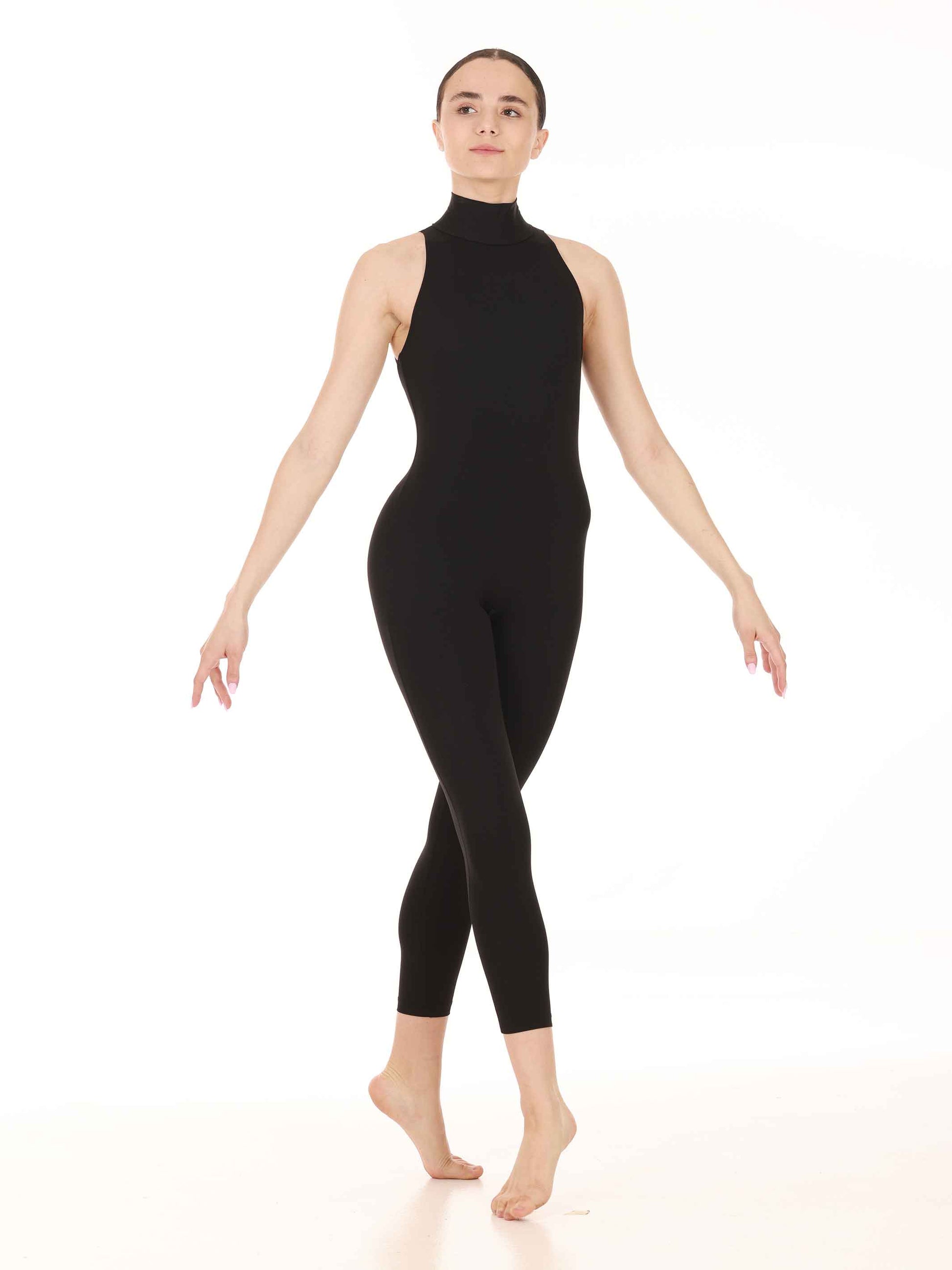 Person wearing a black sleeveless unitard on a white background