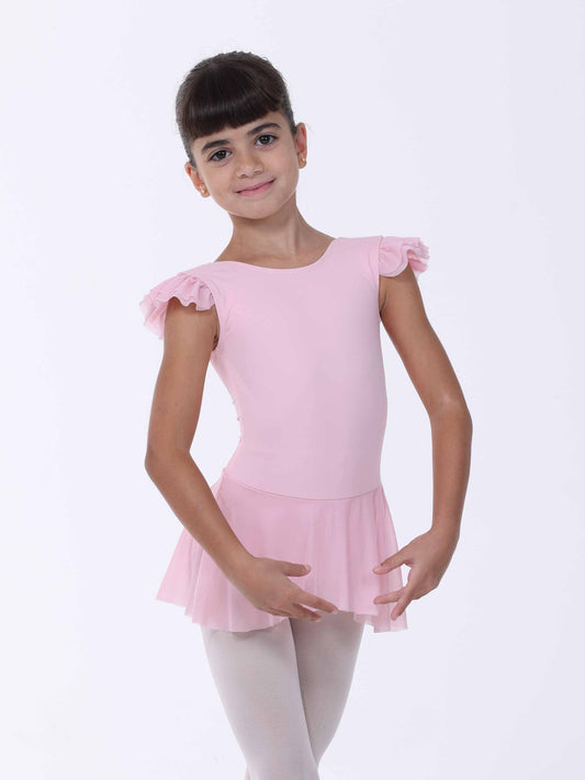 Young girl wearing a pink ballet dress with ruffled sleeves on a white background