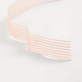 Light pink Elastic Ribbon for Pointe on a white background 