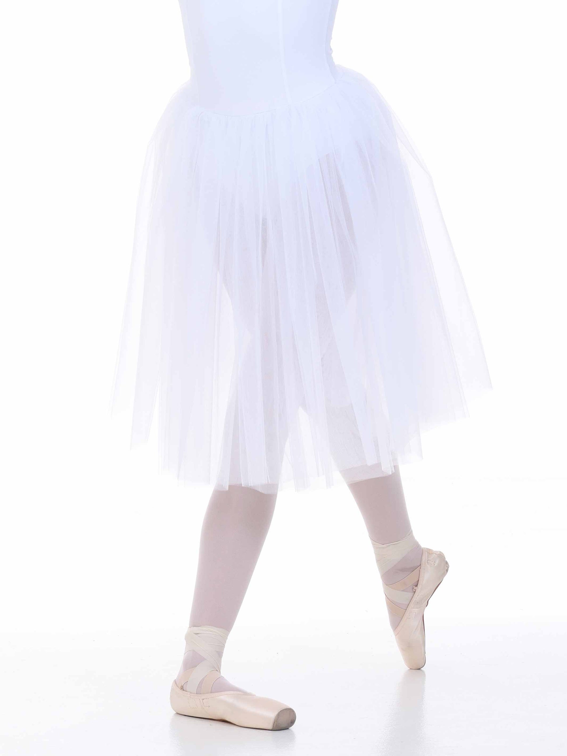Ballerina in a white tutu and tights on a white background