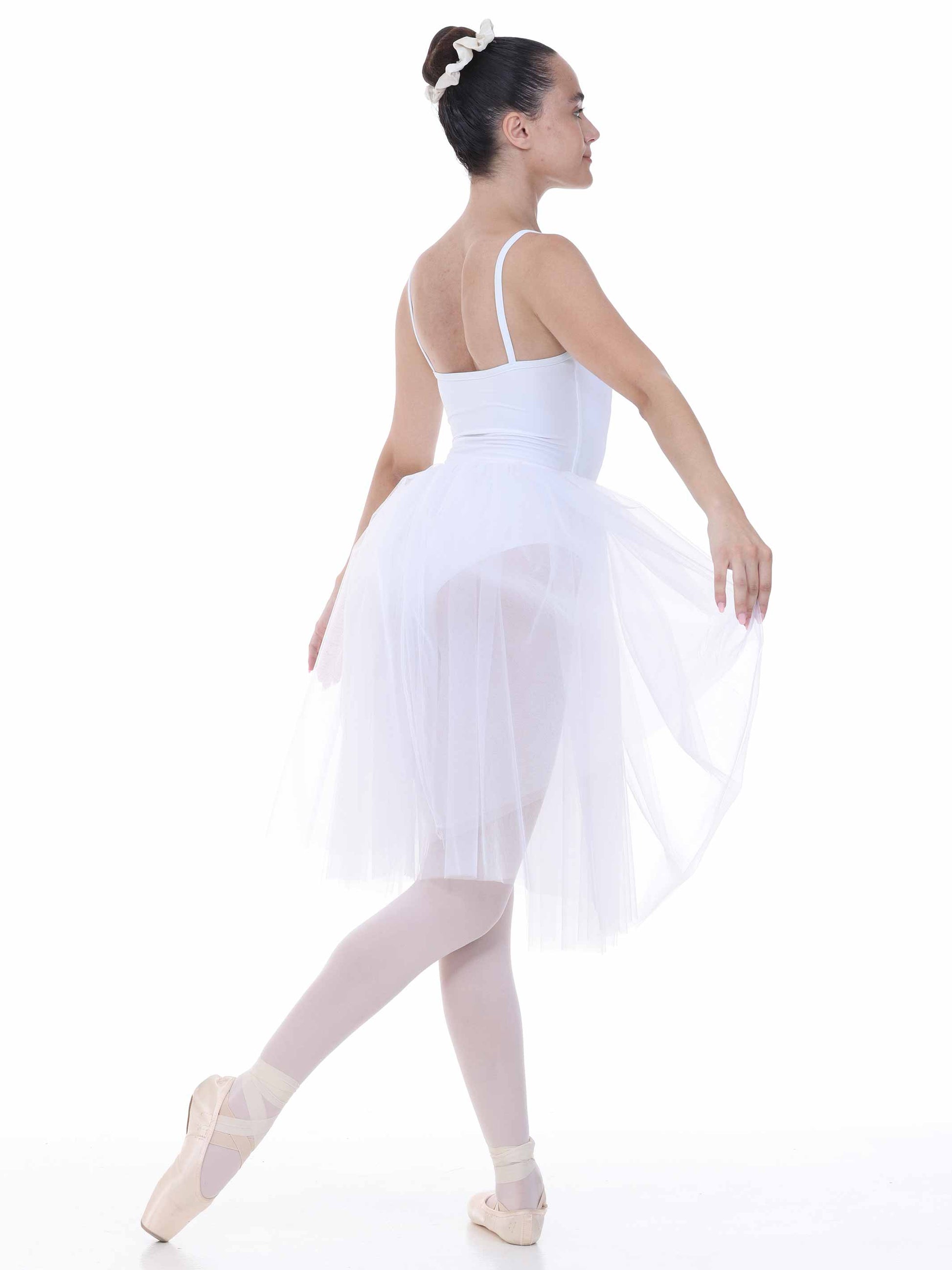 Ballerina in a white tutu dress on a white background
