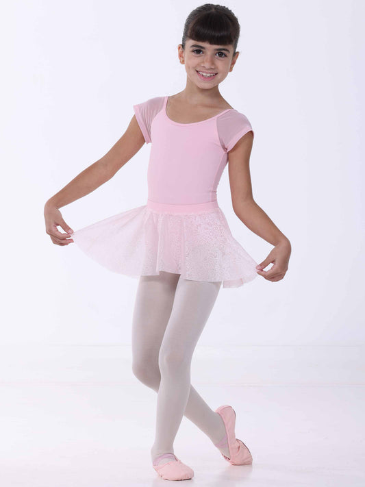 Young girl in a pink ballet outfit on a white background