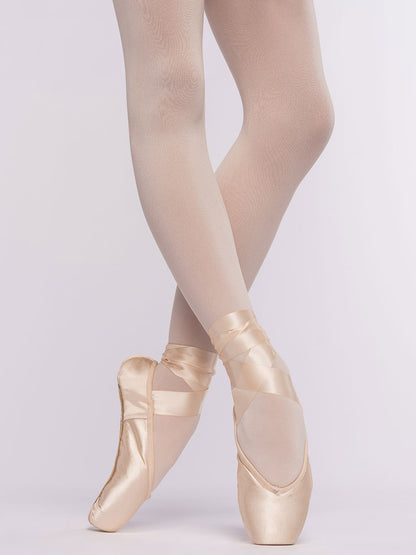 Ballerina wearing a pointe shoes on a white background