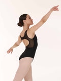 Ballerina in a black leotard with mesh design, performing on a white background