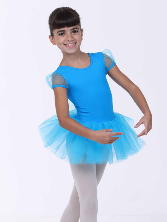 Child wearing a blue ballet dress with a tutu on a white background