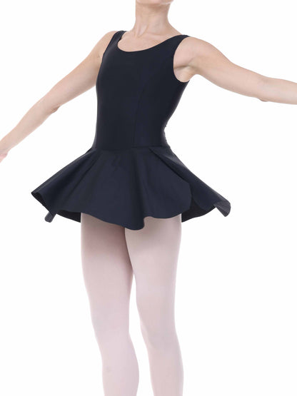 Dancer wearing a black ballet dress with a white background