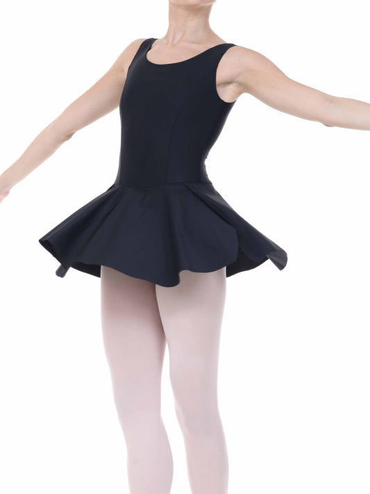 Dancer wearing a black ballet dress with a white background