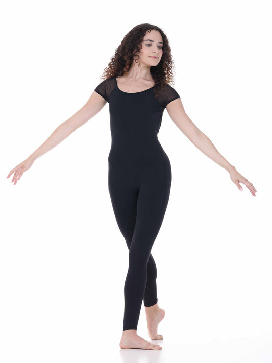 Woman wearing a black unitard on a white background