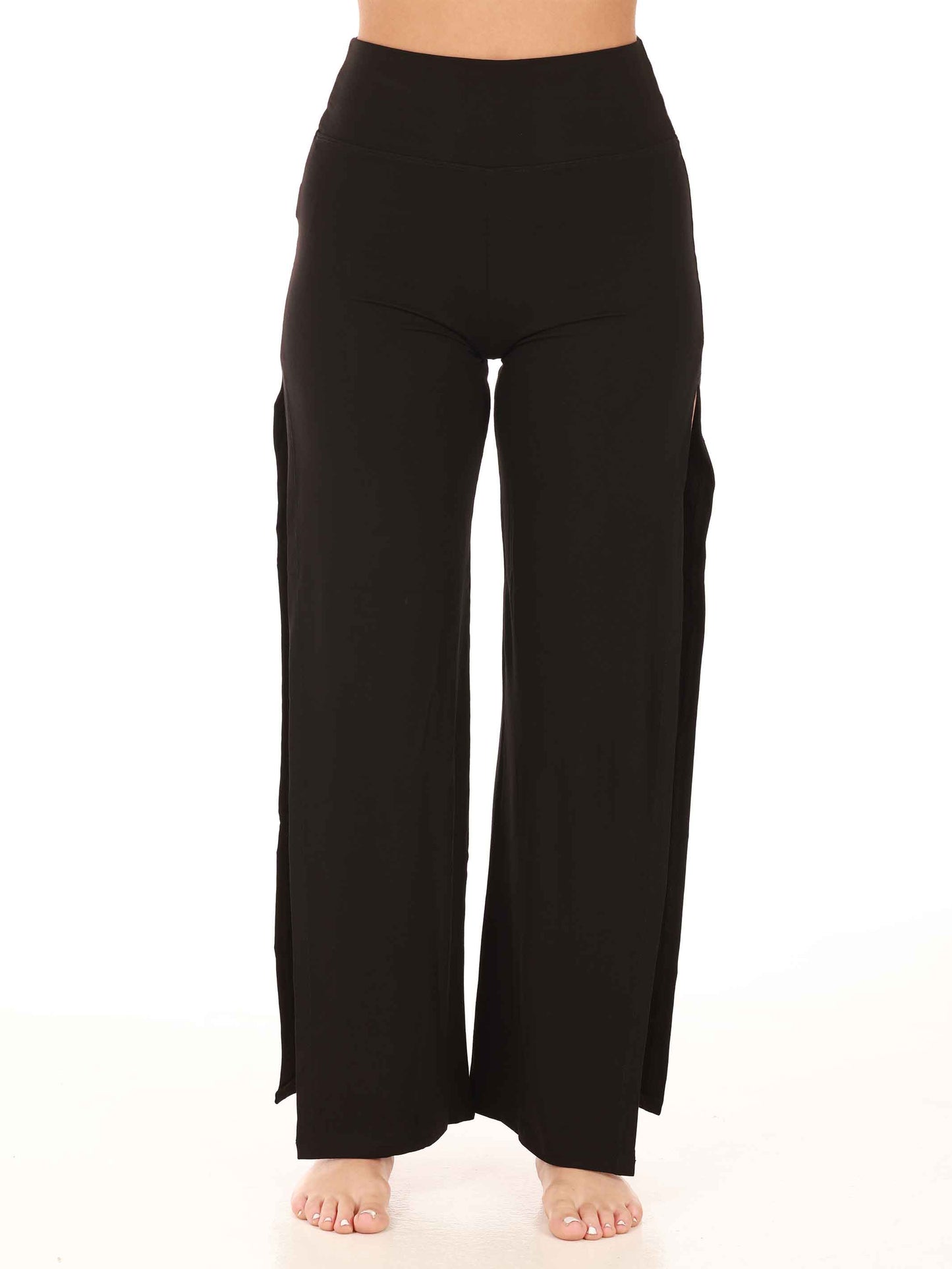 Black wide-leg jazz pants worn by a person on a white background