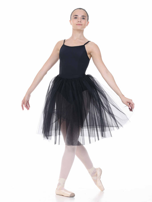 Ballerina in a black leotard and tutu on a white background