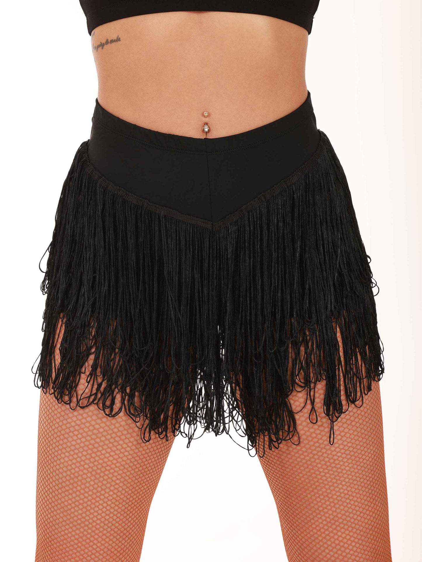 Black fringe latin dance skirt worn by a person on a white background