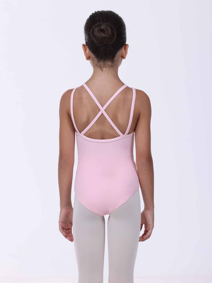 Person wearing a light pink leotard with criss-cross straps on a white background