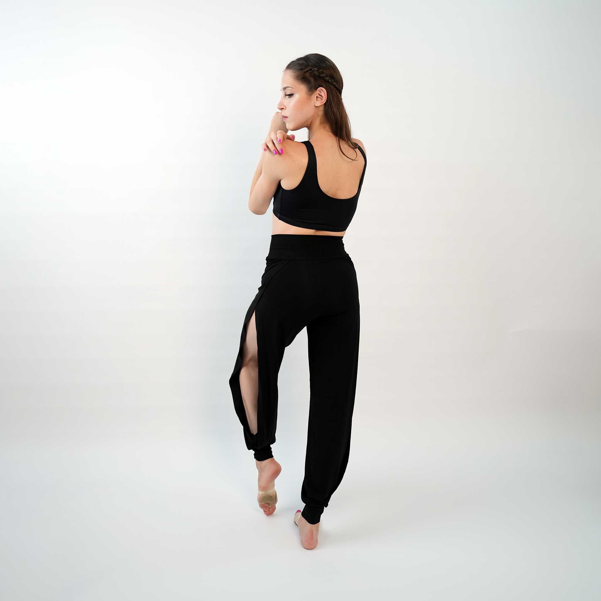 A pair of black yoga dance jazz pants with a high-waisted fit and wide-leg design, featuring a secure waistband and a gathered ankle hem.