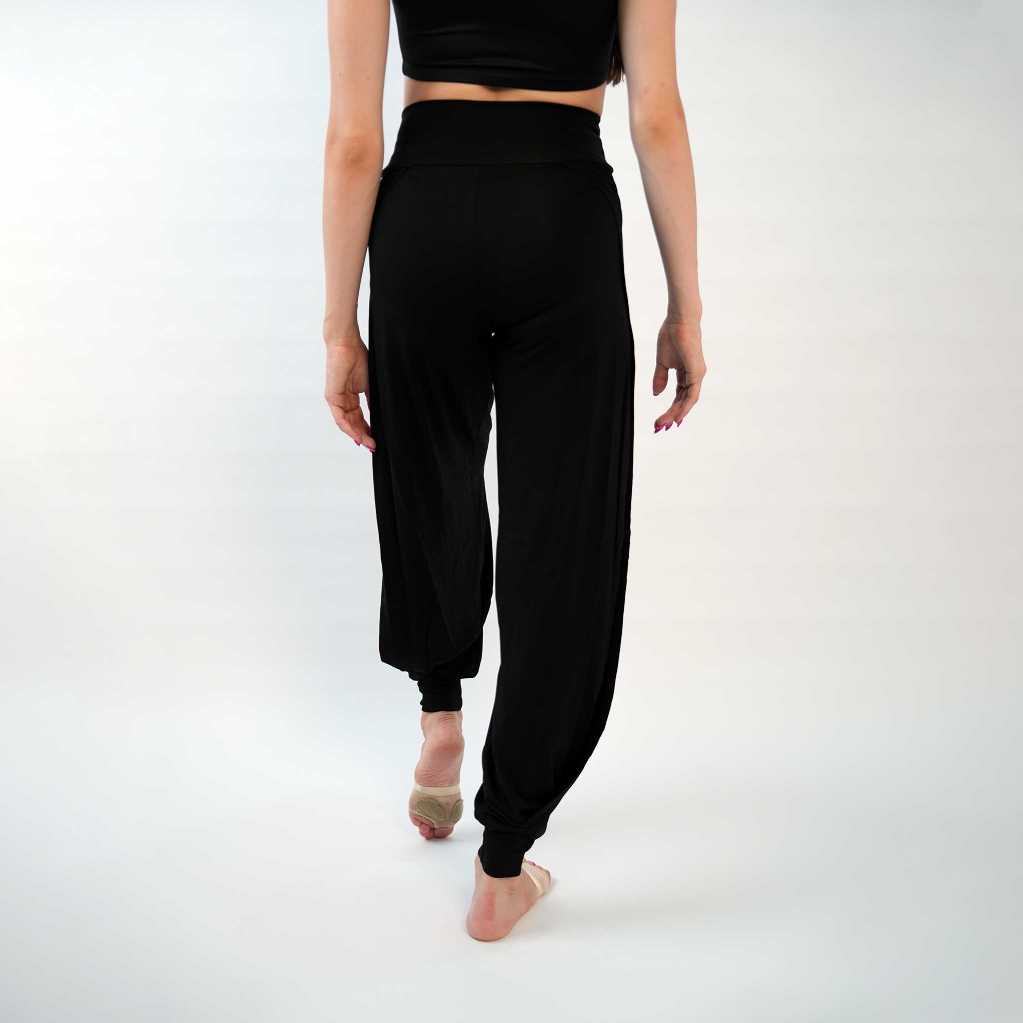 A pair of black yoga dance jazz pants with a high-waisted fit and wide-leg design, featuring a secure waistband and a gathered ankle hem.